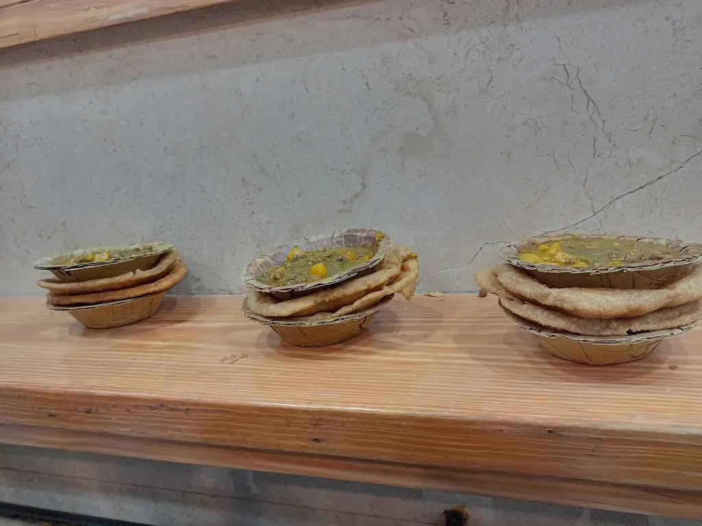 Stacked badi kachoris with sabzi at The Ram Bhandar